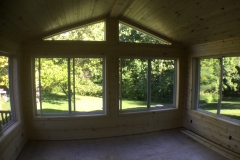 Inside Sunroom knotty pine