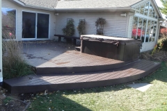 ground deck with steps to backyard